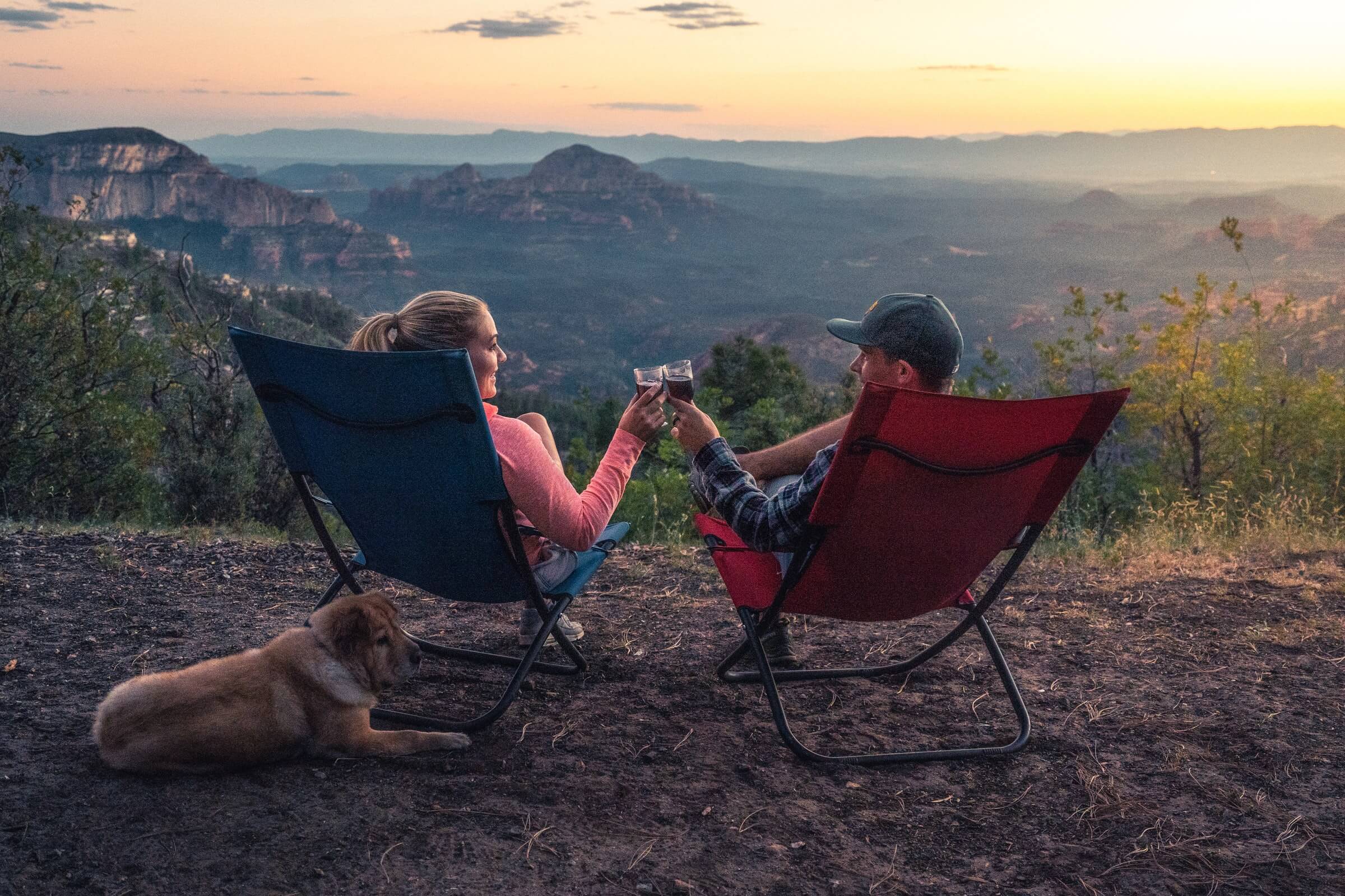 people in chairs on a mountain