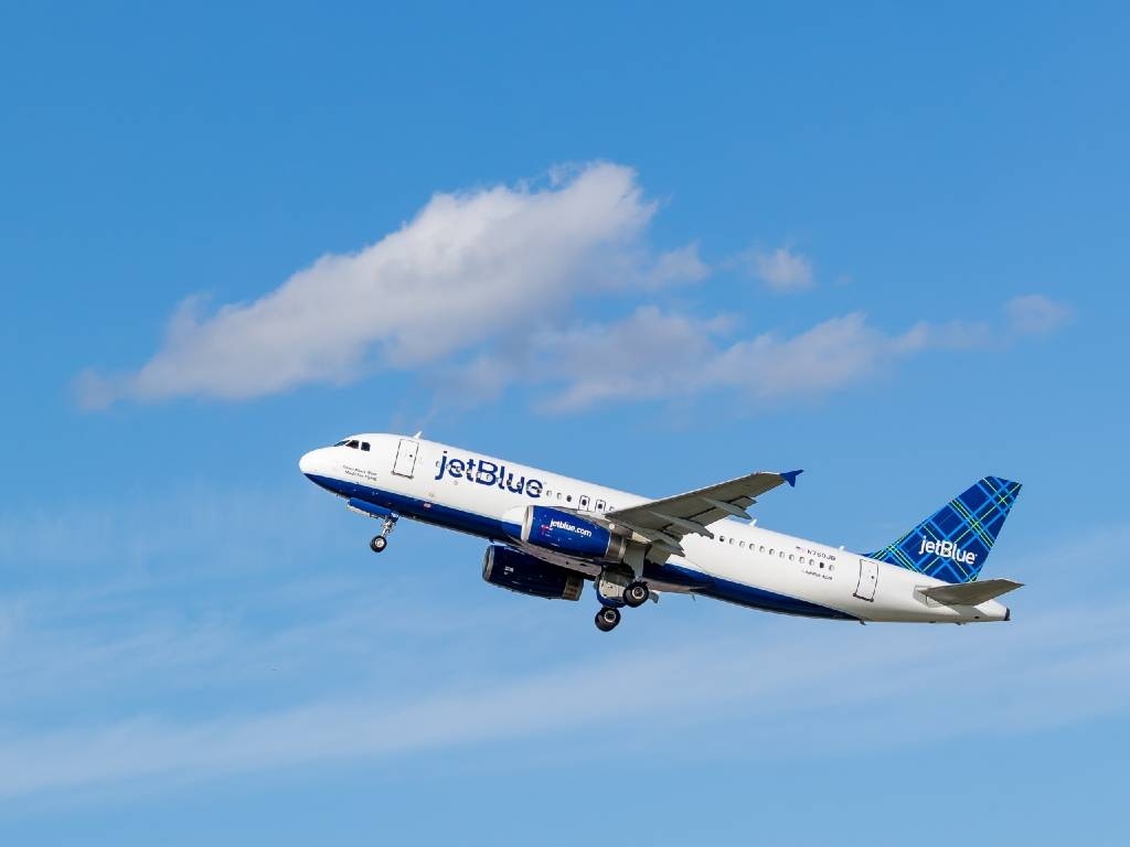 Jetblue plane flying overhead.
