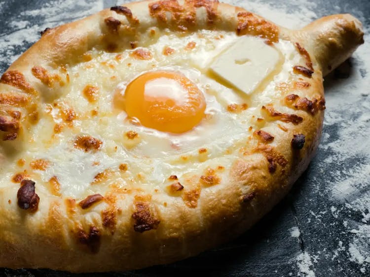 Adjaruli Khachapuri: The Cheesy Bread That’s the Cornerstone of Georgian Community